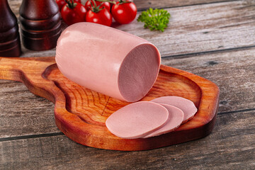 Boiled sausage with slices for breakfast