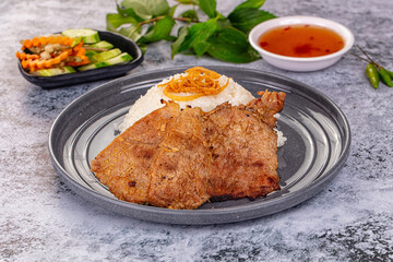 Roasted pork steak with rice