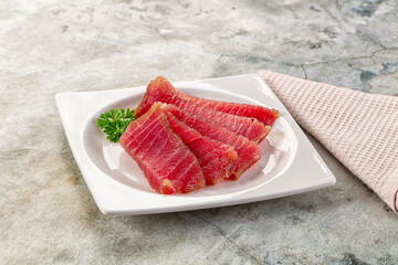 Raw red tuna sashimi slices