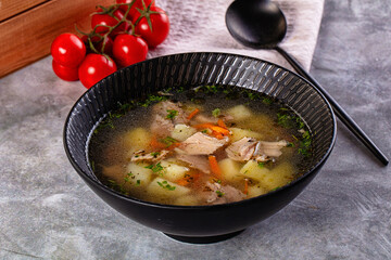 Chicken homemade soup with potato