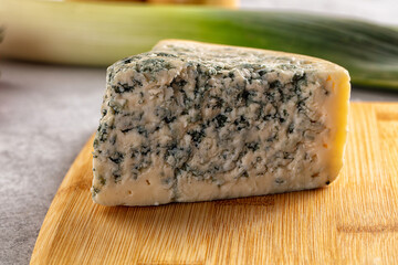 Blue cheese piece over board
