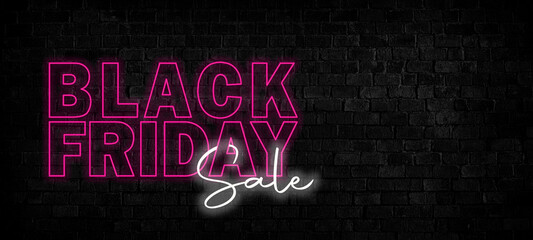Black Friday sale. Black Friday neon sign on brick wall background. Glowing white and violet neon text for advertising and promotion. Banner and background, brochure and flyer design concept