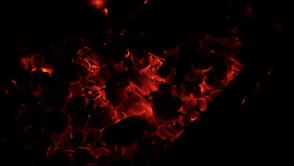 closeup of hot charcoal in dark environment