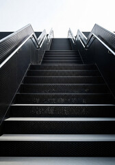 Fototapeta premium Modern Black Perforated Metal Staircase Outdoors