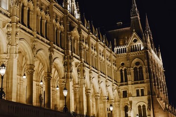 Ornate gothic architecture illuminated at night