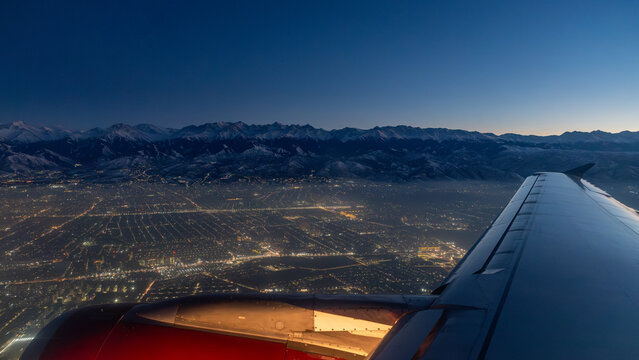 Landing in Almaty city in the night. Kazakhstan