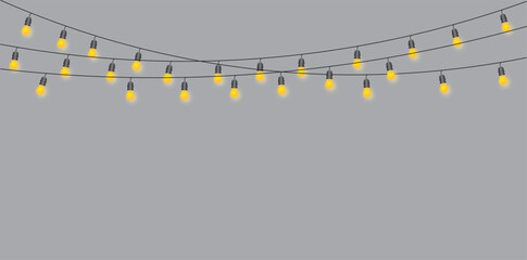 Warm Hanging String Lights on Grey Background &ndash; Festive Golden Bulbs Decoration
