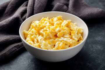Warm plate of traditional German Käsespätzle with melted cheese and crispy onions