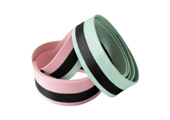 Rolled pink and teal bands with black stripes on black