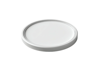 Round, white lid with a molded edge on a black surface