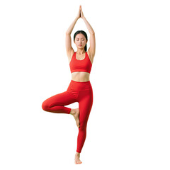 Young Asian woman in red activewear doing yoga pose