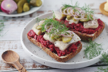 Scandinavian sandwiches with herring and beetroot	