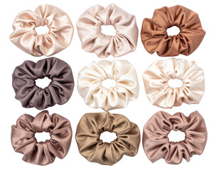 Top-Down Arrangement of Neutral Silk Hair Scrunchies, isolated on transparent background