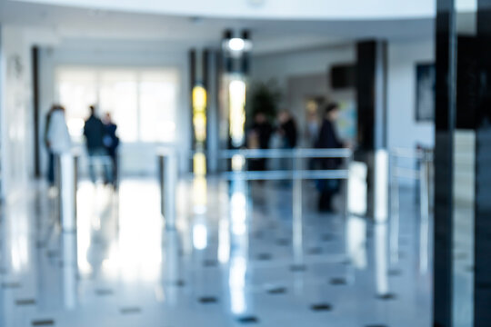 Blurred office background with employees