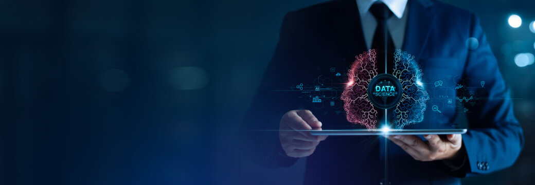 Data science; Analytics of information complex data on Big data with AI technology. Machine learning; Businessman uses a tablet computer business data development on network for planning in future.