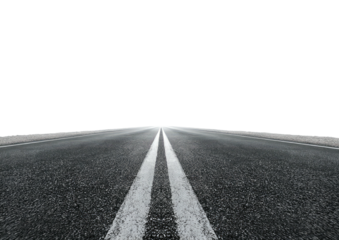 Asphalt road, white lines, leading to distant bright light