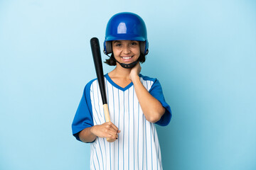Baseball mixed race player woman with helmet and bat isolated on blue background laughing