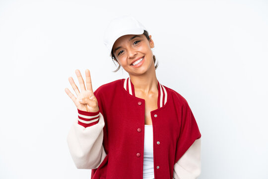 Young hispanic woman wearing a baseball uniform isolated on white background happy and counting four with fingers
