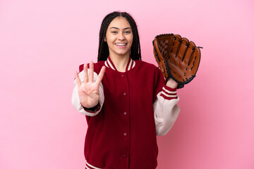 Teenager player with baseball glove isolated on pink background happy and counting four with fingers