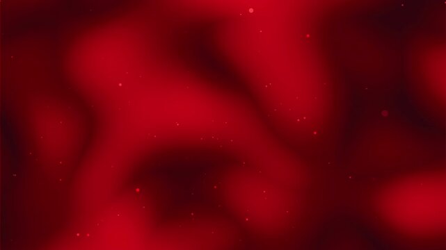 Blurred red background with small bright dots scattered