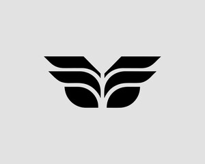 Abstract black bird logo design with wings on a gray background