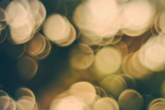 Soft bokeh lights abstract background with warm tones