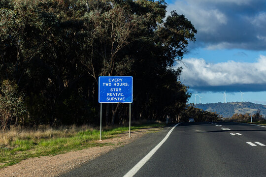 every two hours stop revive survive sign beside road