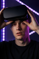 VR eye strain and vision damage concept, gamer with red irritated eyes removing virtual reality headset, cybersickness health risk
