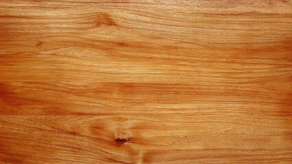 Obraz premium A warm, rich brown wooden texture featuring prominent natural grain patterns, subtle knots, and variations, ideal for backgrounds or design elements.