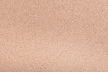 Fototapeta premium Recycled brown paper texture with fine fiber details