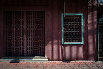 Close up of glass blocks wall allowing light to enter building interior.
