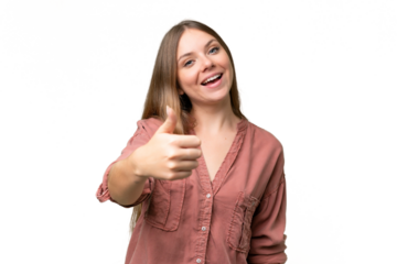 Young beautiful blonde woman over isolated background with thumbs up because something good has happened