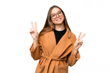 Young blonde woman over isolated chroma key background showing victory sign with both hands