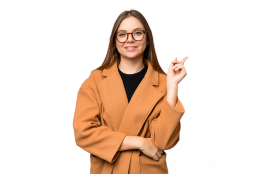 Young blonde woman over isolated chroma key background happy and pointing up - Powered by Adobe