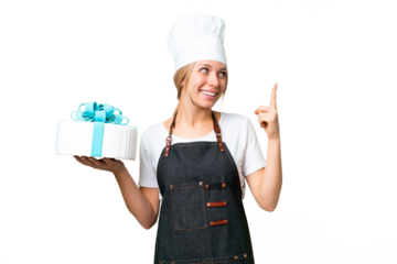 Young pastry blonde woman with a big cake over isolated chroma key background pointing up a great idea