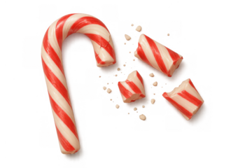 Broken candy cane pieces on transparent background, symbolizing holiday accident, shattered festive joy, or crushed spirit