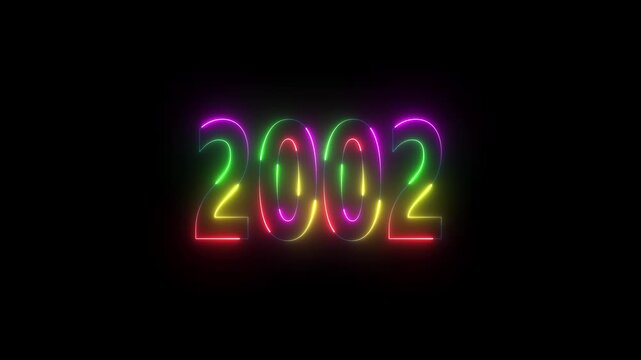 Neon sign showing the year 2002 in a vibrant multi-color glow on a black background lights