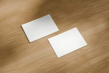 Two Empty Postcards on Wood Surface &ndash; Minimal Paper Stationery Mockup