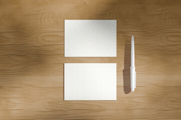 Blank Postcards with White Pen on Wooden Table Mockup
