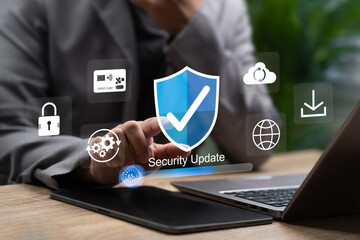 Cybersecurity System Update,Businessman Using Tablet Enhance Security Protection,Prevent Scammer Attacks, Safeguard Financial Data, Ensure Secure Downloading Through Modern Digital Security Management