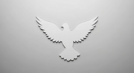 Obraz premium Elegant white dove with spread wings against soft gray backdrop symbolizing peace, hope, and new beginnings for spiritual designs and serene artistic projects