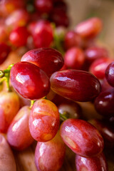 Vibrant Grapes: Close-up of ripe, succulent grapes, showcasing their glossy skins and tempting appeal. 