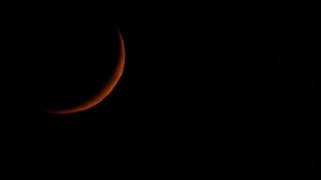 Tokyo, Japan - November 23, 2025: The Crescent moon setting at dusk in winter
