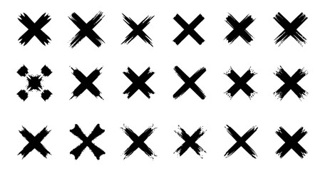 Collection of diverse hand drawn grunge cross marks and brushstroke signs with dirty textures ideal for design elements