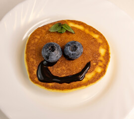 Pancake with Smiley Face on Plate
