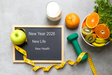 New Year for New Changes Healthy 2026.  Fresh vegetable fruits and healthy food for sport equipment for women diet slimming weight loss.  Healthy and Holiday Concept