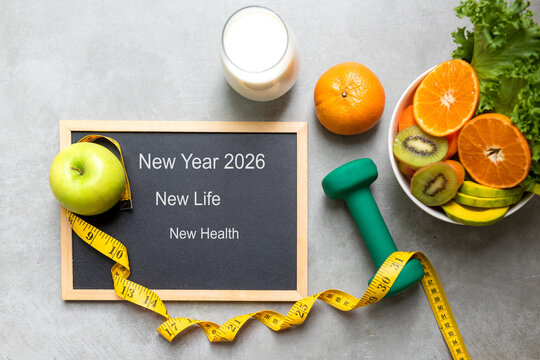 New Year for New Changes Healthy 2026. Fresh vegetable fruits and healthy food for sport equipment for women diet slimming weight loss. Healthy and Holiday Concept - Powered by Adobe