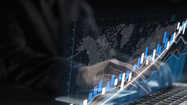 A businessman uses a laptop to analyze marketing data, showcasing a world map and a growing graph representing investment trends and financial performance metrics. Copula - Powered by Adobe