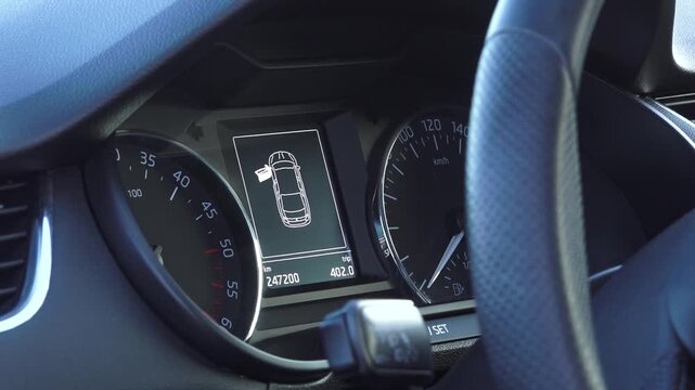 Dashboard View Of A Modern Car With Digital Display And Speedometer Gauges