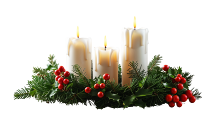 Three lit white pillar candles with festive evergreen and red holly berries
